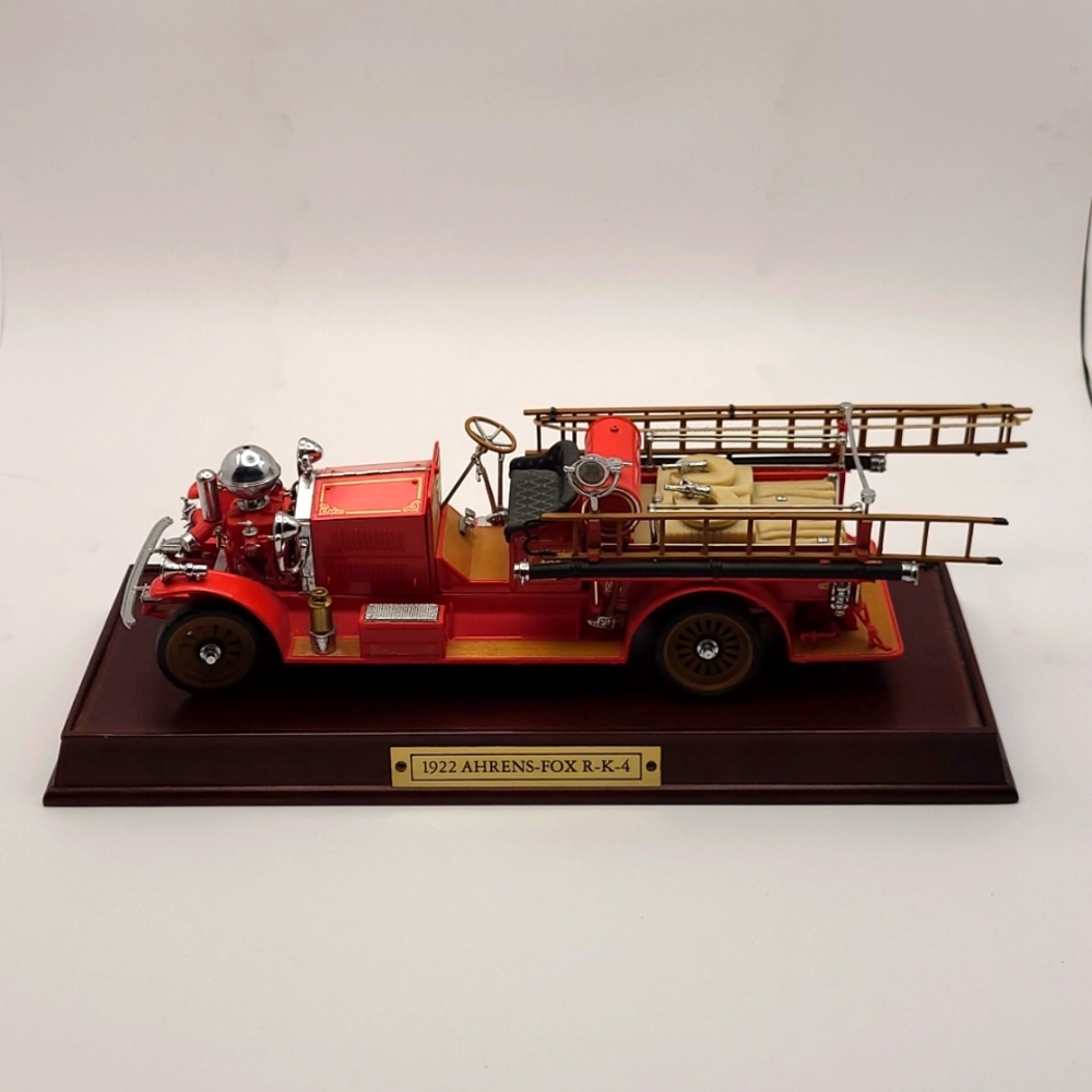 1990 Franklin Mint 1922 Ahrens-Fox R-K-4 model fire engine, wood display stand
